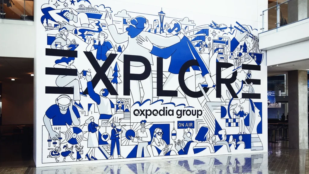 Expedia Group — mur « EXPLORE » — Chris DeLorenzo