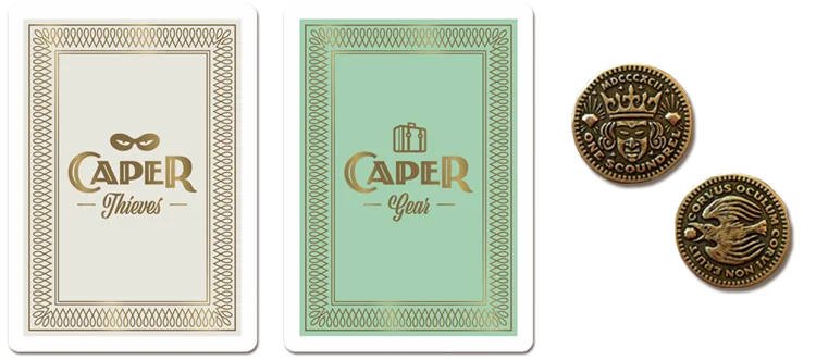 Caper, dos de cartes et pièces — Emrich Office