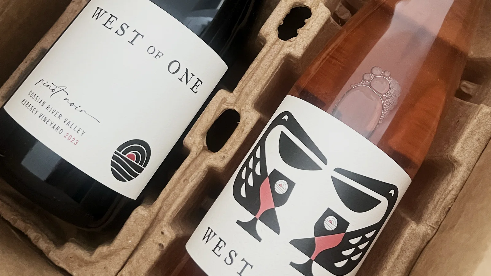 Bouteilles West of One dans une caisse en carton — Ethan Fender